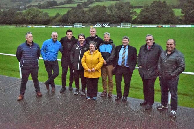 FAW chief executive Noel Mooney (third from left) visited Cae Piod Bow back in September to discuss a range of footballing issues with its committee members and FAW representatives. He is pictured with Wyn Lewis, Peter James, Amlyn Ifans, Lee Crumpler, Bev Hemmings, Rhodri Morgan, Wil Lloyd Williams FAW Councillor, Dai Alun Jones FAW Councillor, and Jonathon Thomas. He will return to officially reopen the club’s 3G facility during the club’s junior tournament this weekend