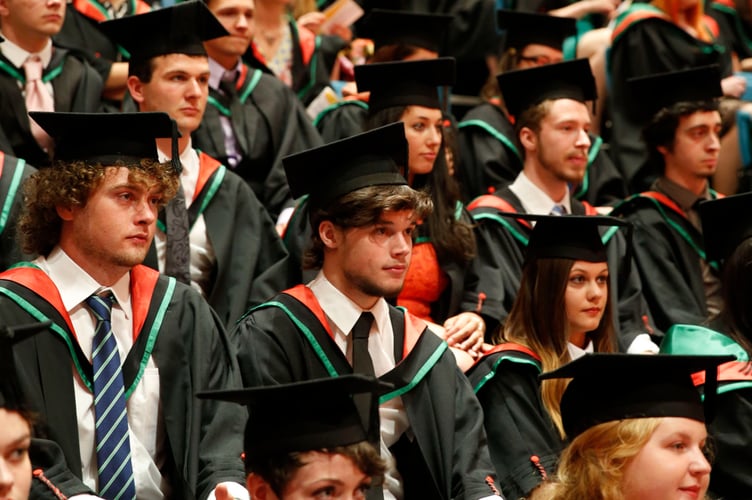 Photo Code DPJ24J20 Photo Arwyn Parry Jones 24July14 Ref Simon; - Graduation; Crowd photo.