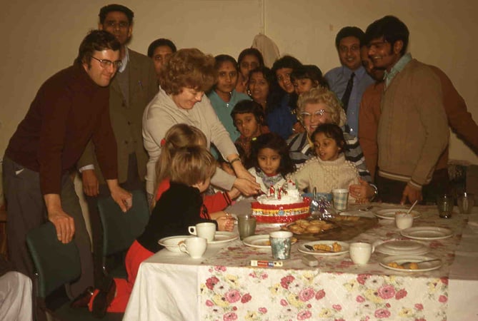 Volunteers at Tonfanau Camp, Christmas 1972, are pictured celebrating with Ugandan refugees