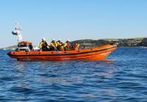 RNLI rescue two people struggling in sea