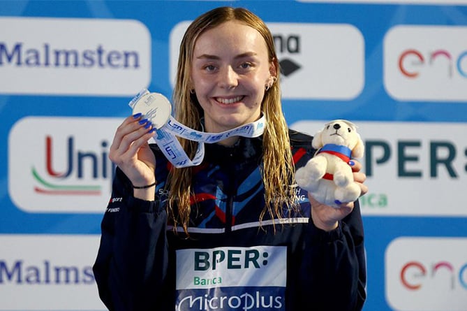 Medi Harris won her maiden international individual medal with silver in the 100m Backstroke at the European Aquatic Championships in Rome