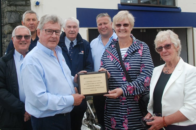 The family of Peter Jones have presented a cheque to Aberystwyth Lifeboat Station