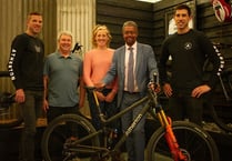 Minister visits Dyfi Valley world champion bikers
