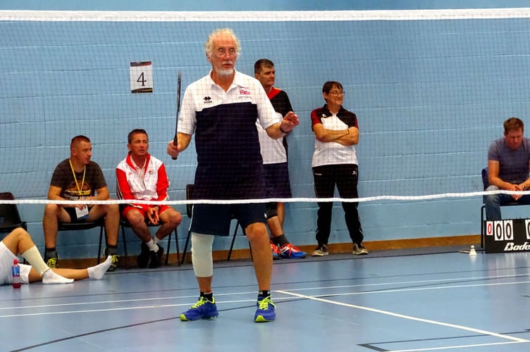 Ieuan Ellis competing in the badminton singles