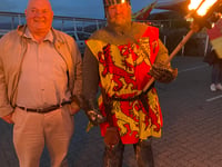 Town cancels procession out of respect for the Queen