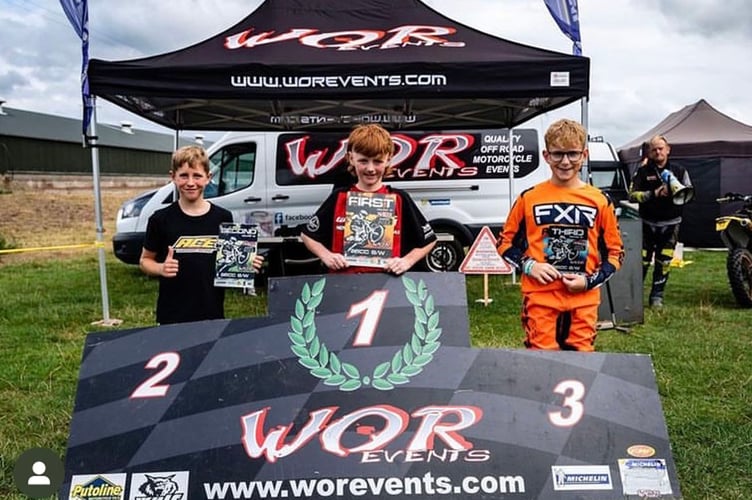 Jack Brooks on the podium after winning the Welsh Open Youth Hare & Hound Series.