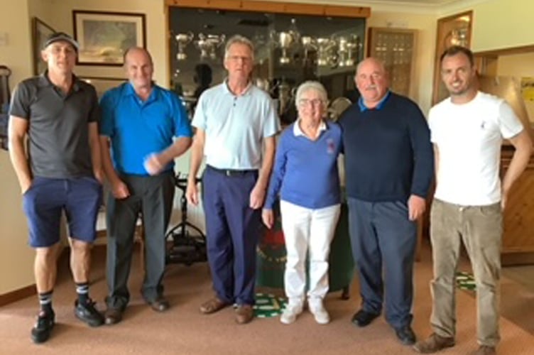 President Nans Morgan and organiser Dexter Lewis presenting the winners of the Sponsors’ Day who were E & M Motor Factors, Borth & Ynyslas GC, 09/22