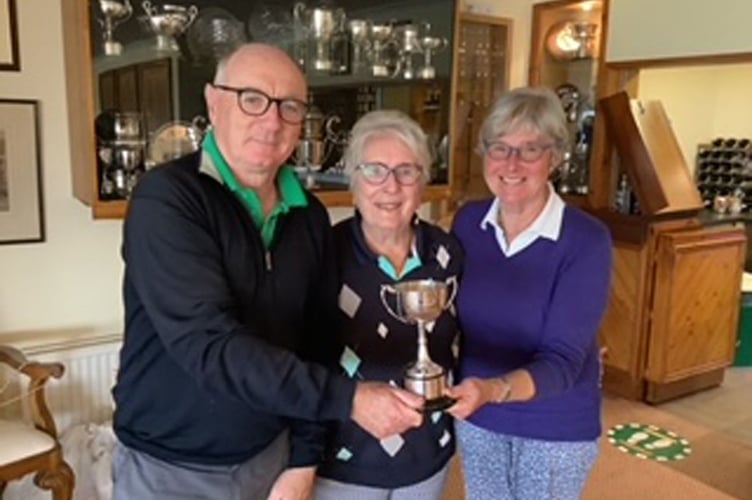 President Nans Morgan (middle) presenting the Deulwyn Morgan Cup to the winners Athole Marshall and Jean Harrison, Borth & Ynyslas GC, 09/22
