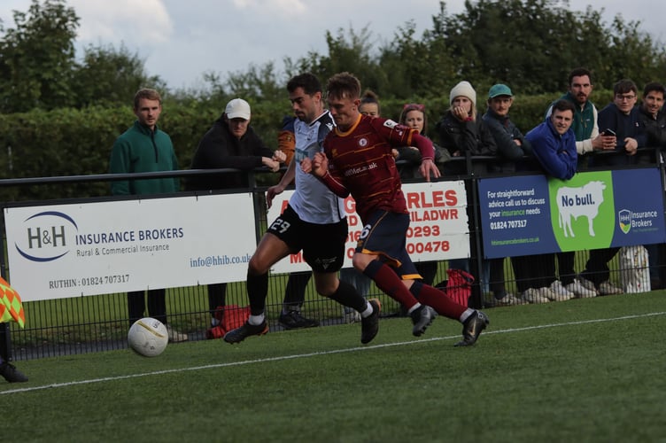 Bala Town’s Ollie Shannon battles for possession against Cardiff Met in their 2-0 win at Maes Tegid