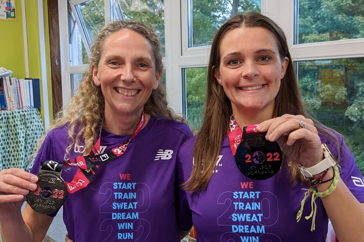 Carol Macy and Anna Bates with their London marathon medals 2022