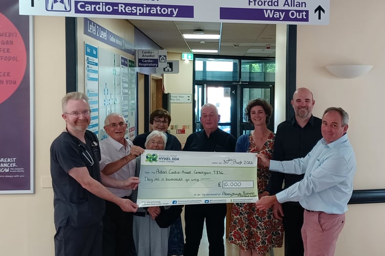 Consultant Cardiologist Dr Donogh McKeogh; Aled and Rose Rowlands; John Davies’ widow Ann; Frank Bridle; John’s daughter and son, Angharad and Rhodri; and Iestyn Leyshon.