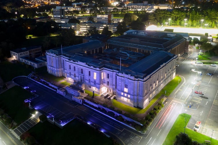 National Library of Wales lit in purple light