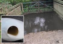 Pollution fears as river ‘runs black with slurry’