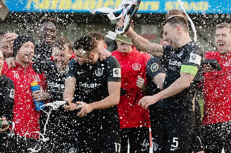 BRIDGEND, WALES - 6 FEBRUARY 2022: Connahâs Quay celebrate during the MG Cup Final between Cardiff Metropolitan University F.C & Connah's Quay Nomads F.C at the The SDM Glass Stadium, Bridgend, Wales, February 6th 2022. (Pic By John Smith/FAW)