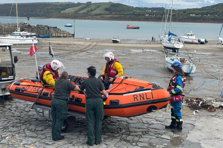 New Quay RNLI meeting the ambulance service on the pier