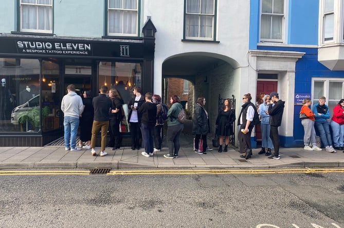 The reason people are queuing around the block on Chalybeate Street today | The reason people are queuing around the block on Chalybeate Street today |