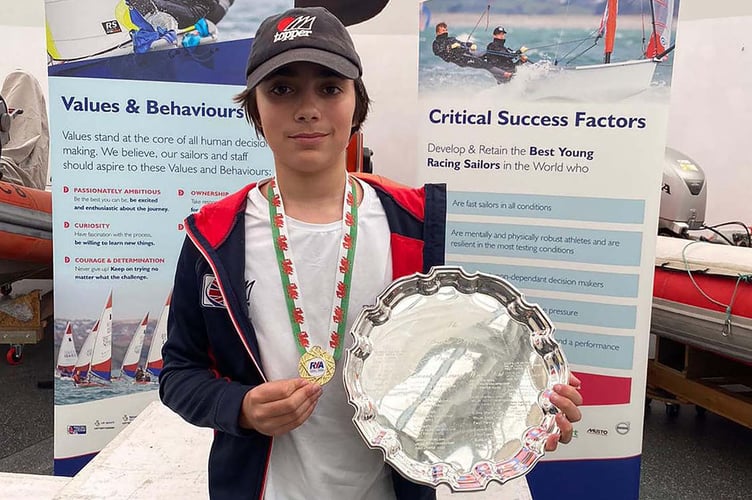 Jasper with his trophy and medal for winning his 5.3 Topper class at the RYA Cymru Wales Welsh Youth and Junior Championships 2022