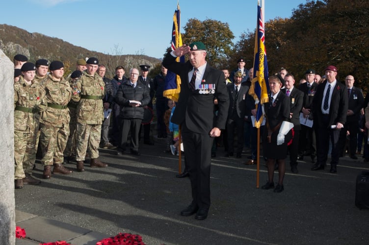 Neil Williams laid a wreath on behalf of the Royal Marines during the Remembrance Sunday service in Porthmadog