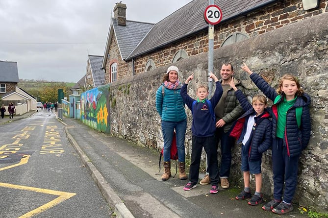 Stephanie Sullivan, her two sons, and another enthusiastic parent support the 20mph switch in St Dogmaels