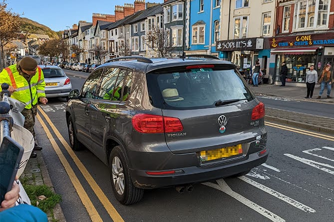 Onlookers had to stop cars that made their way onto the route of Aberystwyth’s Remembrance Sunday Parade ()