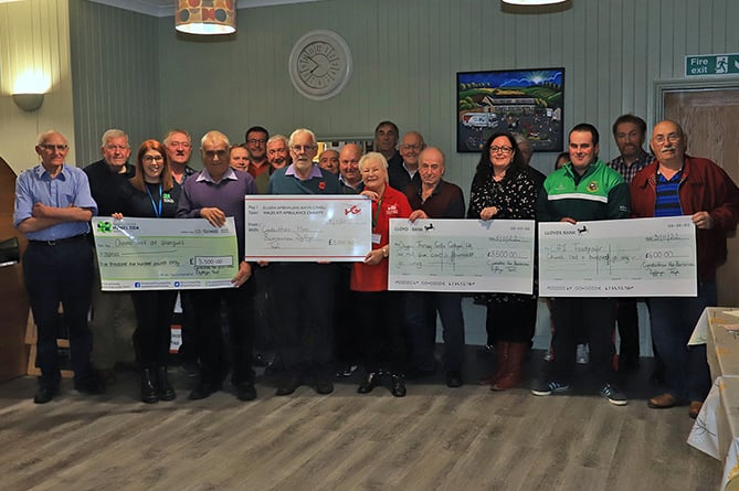 Beneficiaries were presented cheques by Teifi Valley Vintage Preservation Society at Café Emlyn