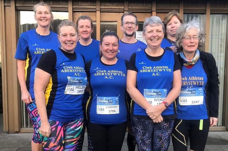 l-r Bethan Evans, Helen Williams, Ceirios Evans, Lynsey Wheeler, Paul Scullion, Wendy Williams, Rachel Richards, Maggie Collingborn at Conwy Half Marathon  2022
