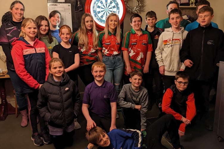 Sion Davies and sister Llinos and Elonwy Thomas at Lampeter’s Bedlam Junior Darts Academy