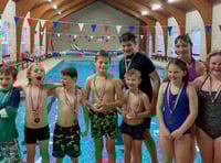 Children hold sponsored swim to help friend