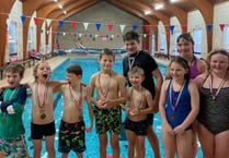 Children hold sponsored swim to help friend