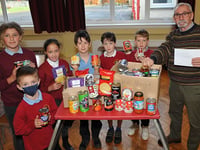 Kind-hearted pupils donate boxes of products to local foodbank