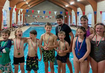 Young swimmers raise funds for pool and friend with rare condition