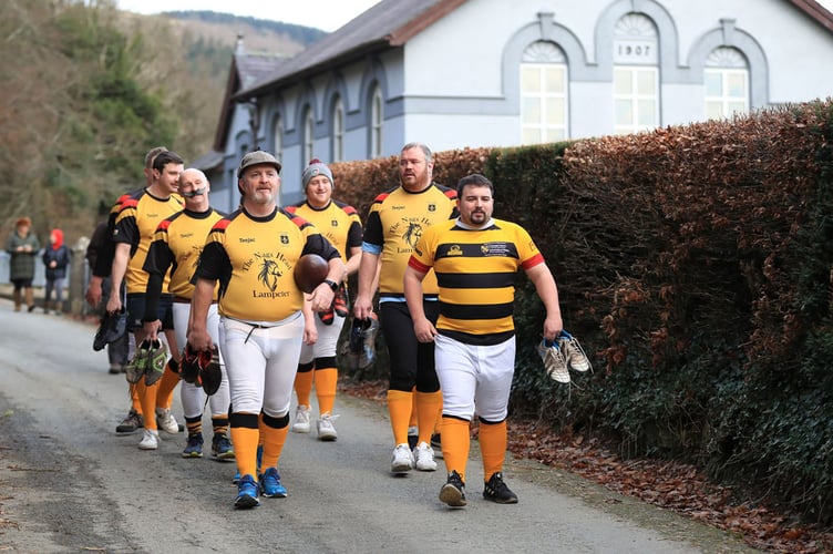 02.12.22 First Rugby Game Under Rules_Wales

The first ever organised game of rugby in Wales between St Davidâs College, Lampeter and  Llandovery College commemorated in the very village where the clash  took place 166 years ago 
A game between Trinity St Davidâs College, Lampeter Past and Present and a Llandovery College XV was played n Caio â a village half way between the two towns â on the very field where the game was first played in the Principality.
