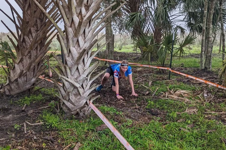 Freya take on one of the 30 obstacles on the course 2022