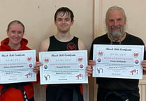 First Dan black belts for Black Wolf trio