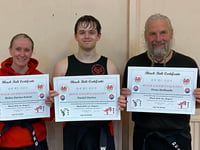 First Dan black belts for Black Wolf trio