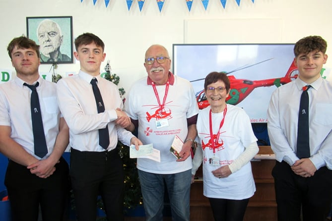 Mr and Mrs Staite pick up the school’s donation on behalf of Wales Air Ambulance
