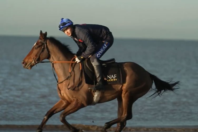 Chris Hughes being put through his paces riding Kitty’s Light on Traeth yr Avon beach