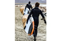 Floodwater paddleboard warning as Wales faces fresh deluge
