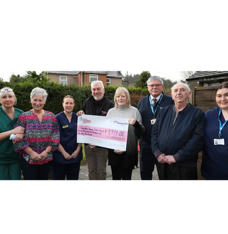 Pictured at the garden are (from left) Health Care Assistants Sharon Brown and Tracey Spooner, Junior Sister Sara Williams, Guy Jones of the National Lottery Community Fund, former Senior Sister Christine Bryant, Business Manager (North) Tony Goodman, Nye Jones of the League of Friends and Senior Sister Ellie Jolley-Dawson.