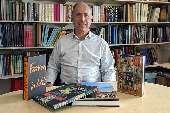 Gomer Press managing director Jonathan Lewis with the books entered for the award