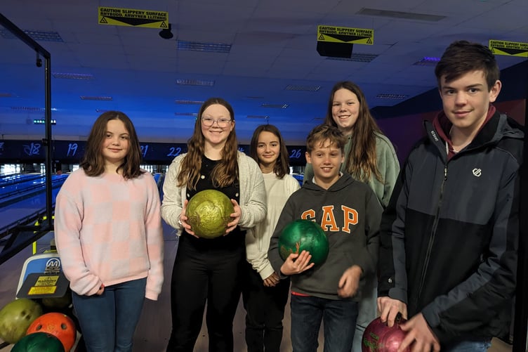 The youngsters enjoy a bowling session before visiting the pool