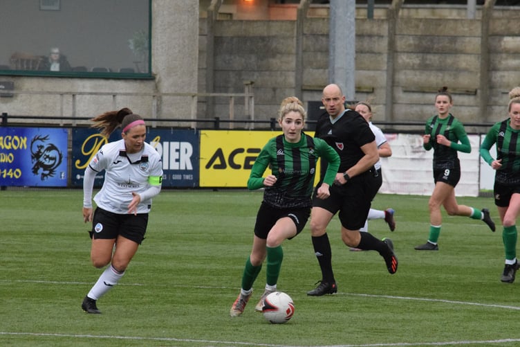 Emily Thomas on the attack for Aberystwyth Town Women