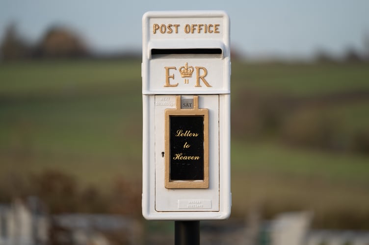 Matilda Handy, 9, and mum, Leanne Handy 45 with their letter box to heaven, in Gedling Crematorium, which allows grieving members of the public to write a letter to their loved ones who have passed away. A nine-year-old girl's 'postbox to heaven' idea which allows people to send letters to their deceased loved ones is to be rolled out nationally at crematoriums across the UK. See SWNS story SWLNpost. Grieving Matilda Handy suggested the heartwarming idea while looking for a way to express her emotions after her grandparents passed away. The schoolgirl wanted to send her late grandma/nan/gran and granddad letters and cards so her family approached Gedling Crematorium, in Lambley, Nottingham. Crematorium bosses responded by installing an old Royal Mail postbox painted white just before Christmas, which led to more than 100 letters being posted. The postboxes are now set to be implemented at more than 40 other sites across the country after Matilda's moving tribute to her grandparents proved so popular.