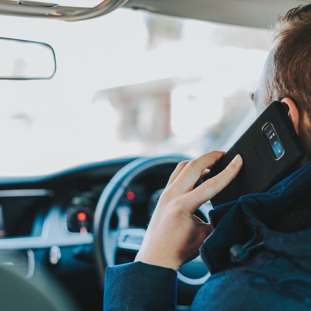 Fine for using mobile phone while driving