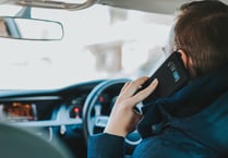 Fine for using mobile while driving