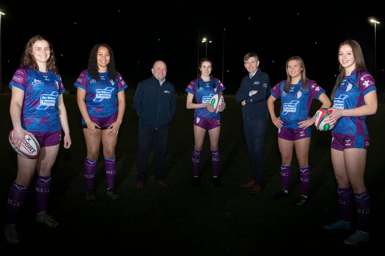 Ifor Williams Trailers sponsors of under 18's Ladies Rugby; Paul Davies and John Williams of Ifor Williams Trailers with rugby players Branwen Metcalfe, Llio Mutembo, Neisha Roberts,Catrin Stewart and Hannah Lane . Picture Mandy Jones