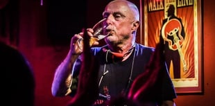 Punk poet Attila the Stockbroker in night at the museum