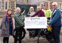 Carol singers raise £1,100 for good causes