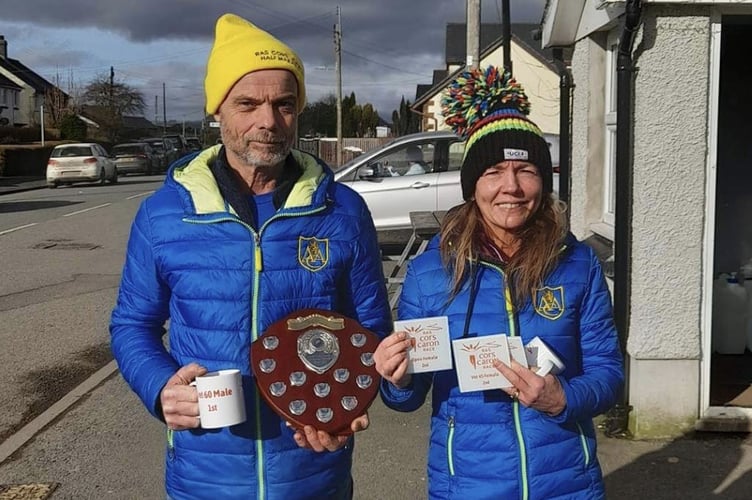 Damian Sidnell and Lynwen Huxtable with their awards at the Tregaron Half Marathon