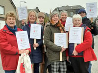 WI march raises awareness of Stop Violence Against Women campaign
